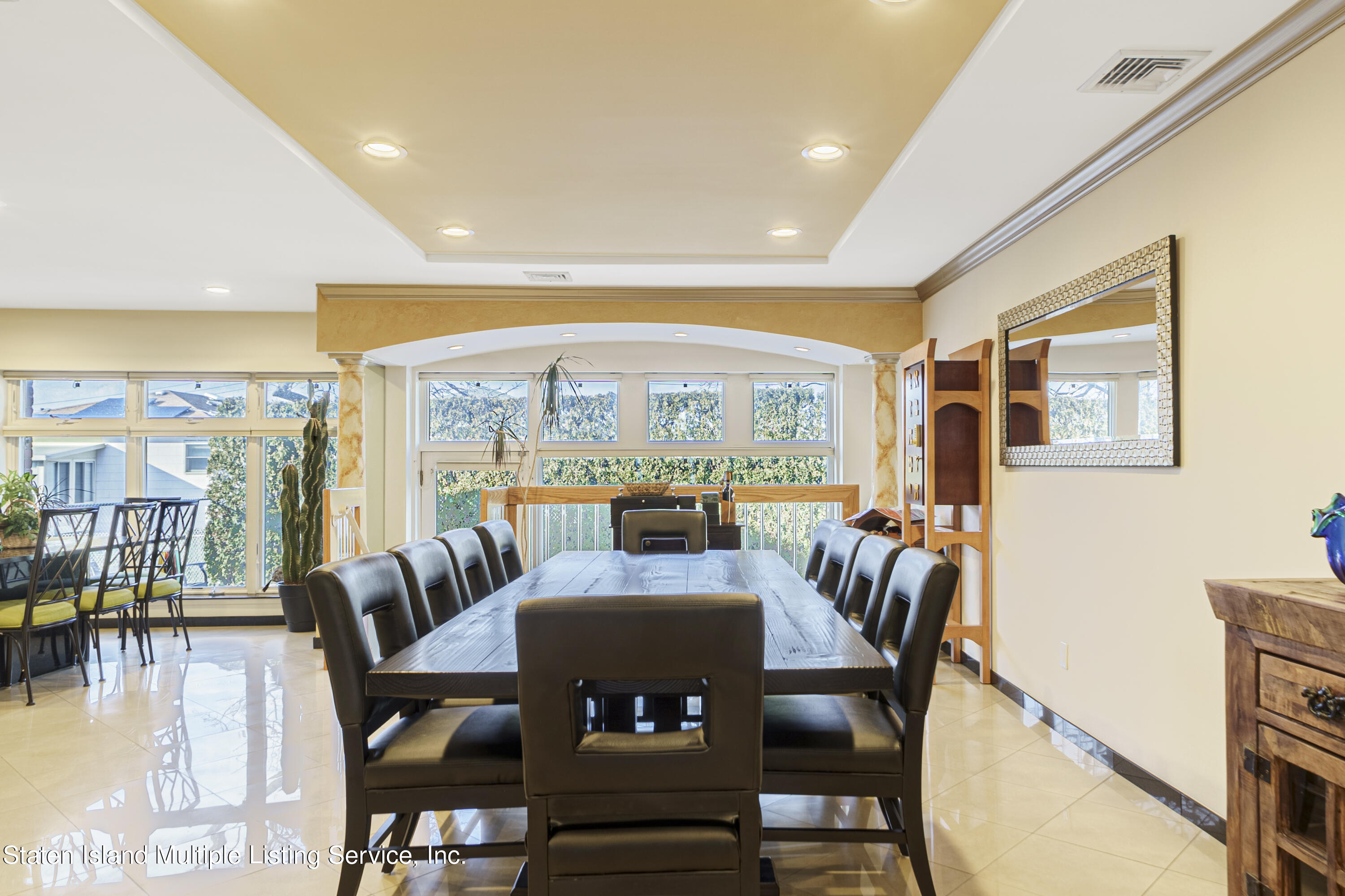 19 Bascom Place Staten Island, NY 10314 - Photo 9 of 54 a living room with furniture and a large window