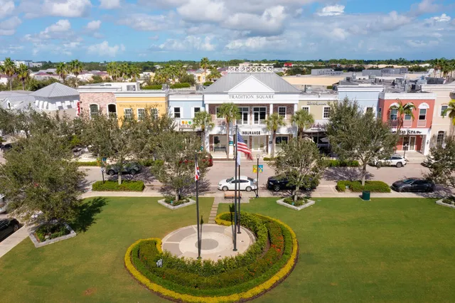 a swimming pool with trees in the background