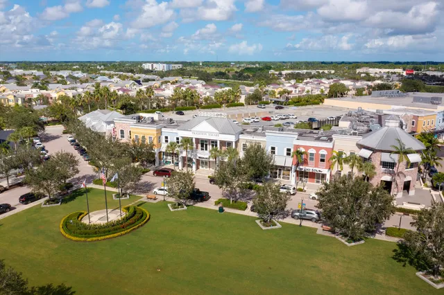 a view of a city with lawn chairs