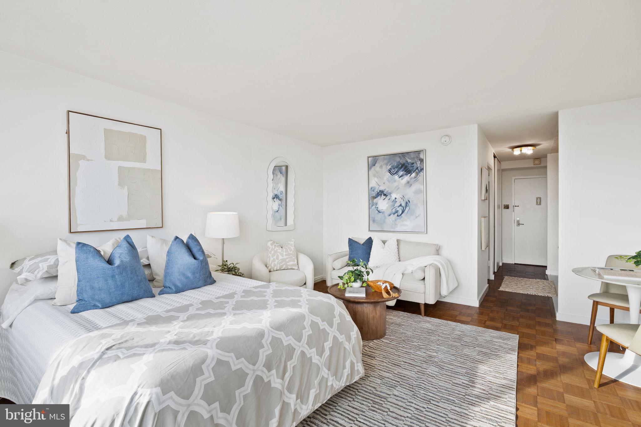 604 South Washington Square, Unit 913 Philadelphia, PA 19106 - Photo 5 of 24 a bedroom with bed and wooden floor