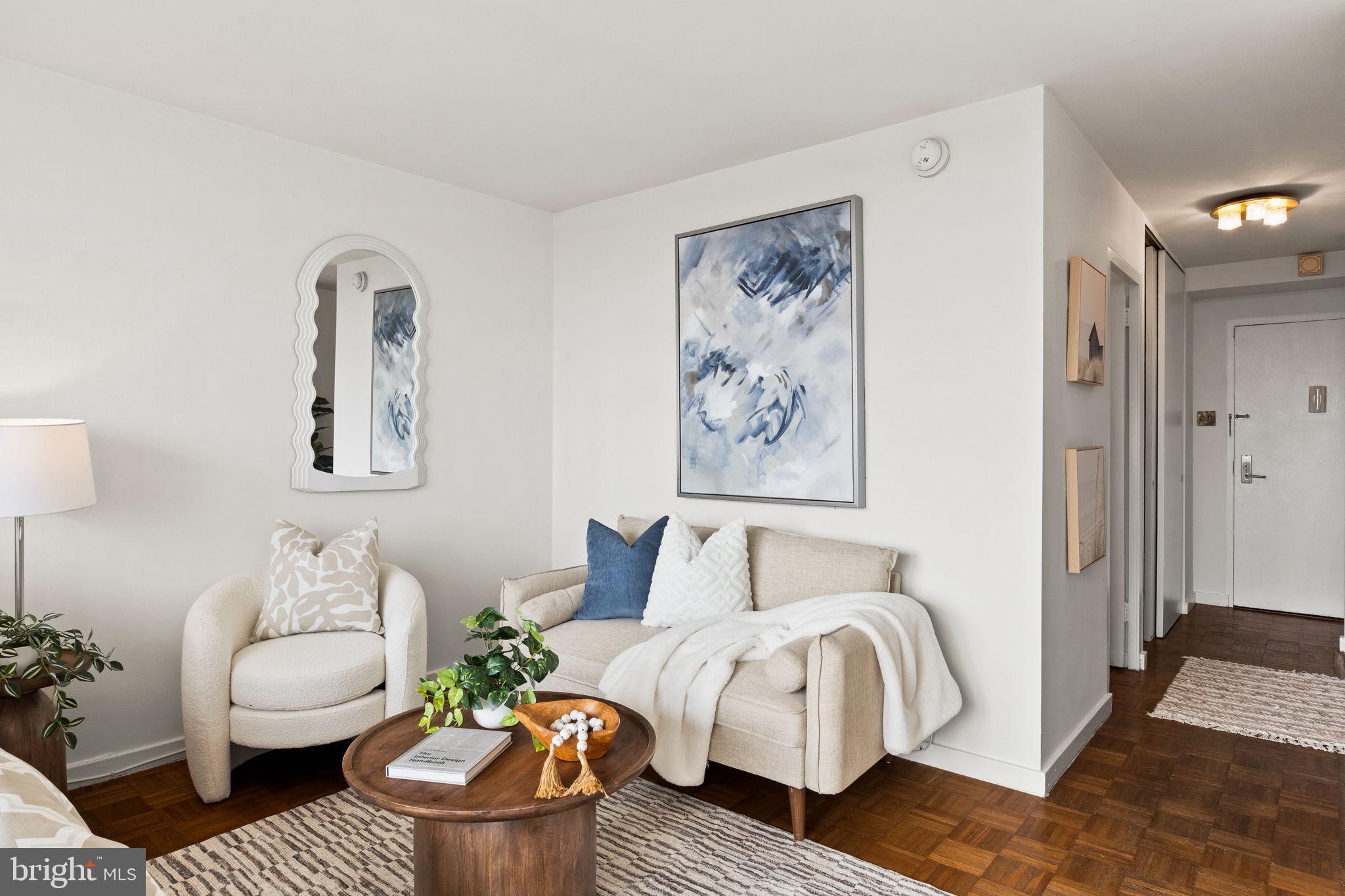 604 South Washington Square, Unit 913 Philadelphia, PA 19106 - Photo 6 of 24 a bedroom with a bed and a couch