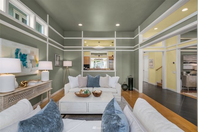 a living room with furniture and a table
