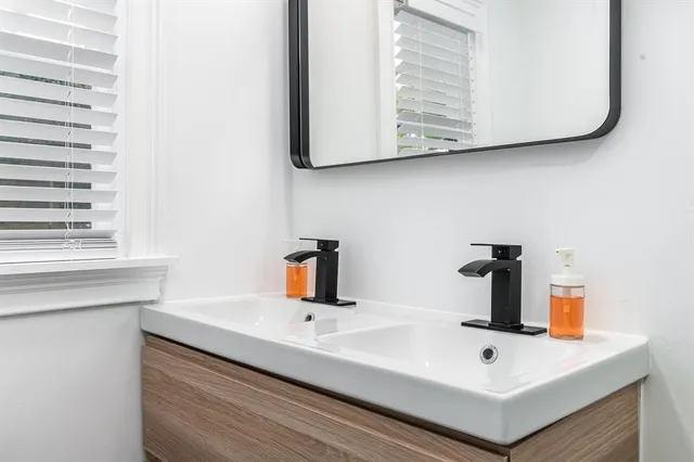 a bathroom with a toilet and a sink