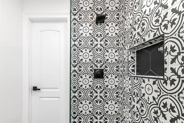 a view of a chair and table in backyard