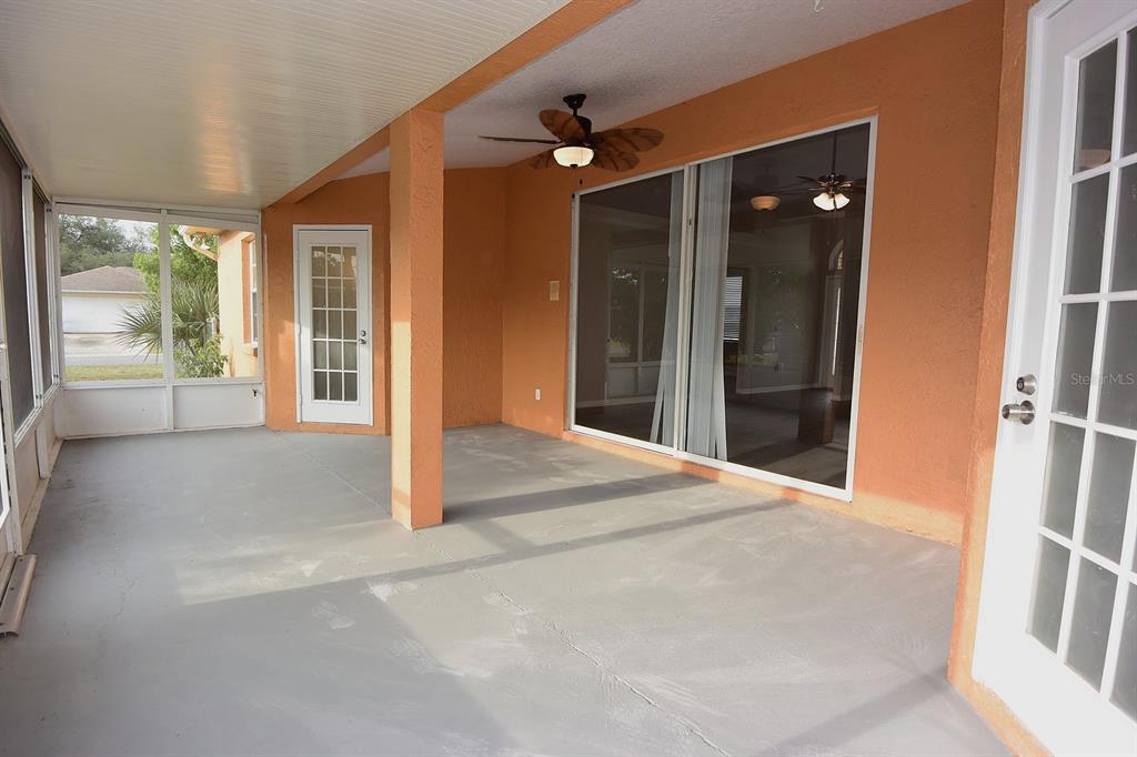 2339 Renton Lane Spring Hill, FL 34609 - Photo 28 of 35 wooden floor and window in an empty room
