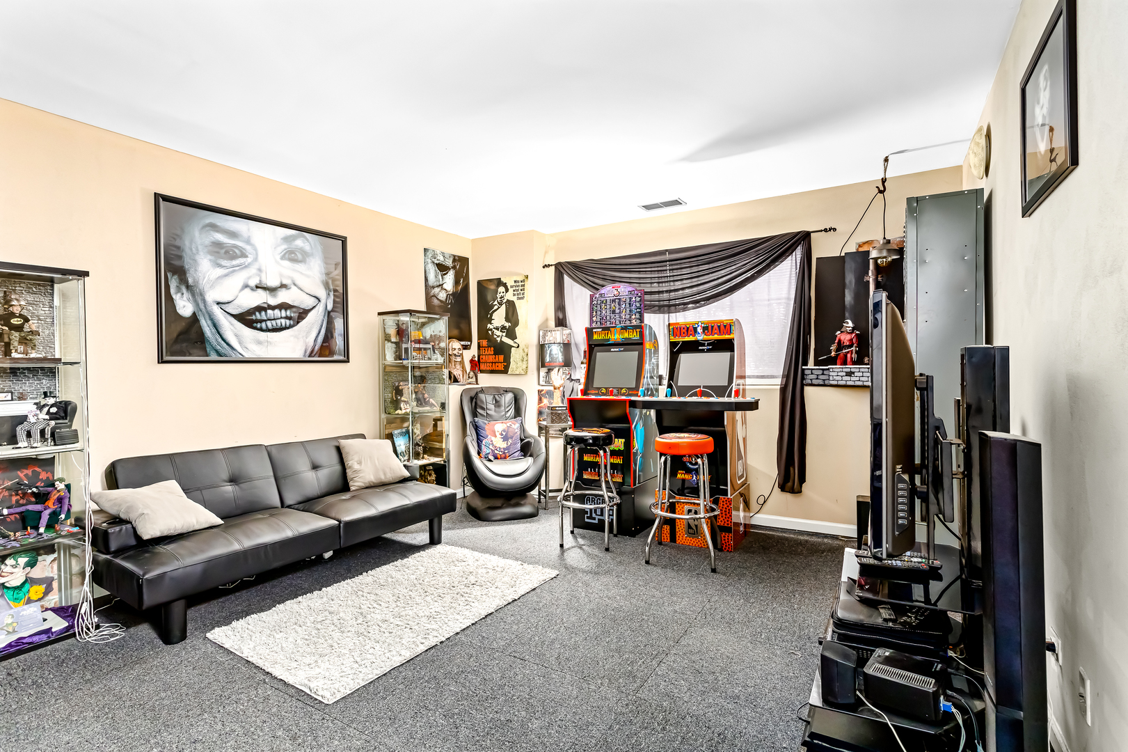 3389 Ravinia Circle, Unit 3389 Aurora, IL 60504 - Photo 18 of 23 a living room with lots of furniture and gym equipment