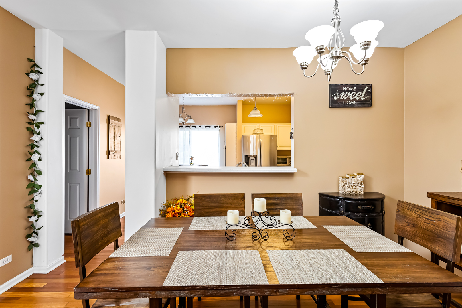 3389 Ravinia Circle, Unit 3389 Aurora, IL 60504 - Photo 6 of 23 a picture of a room with a table and chairs