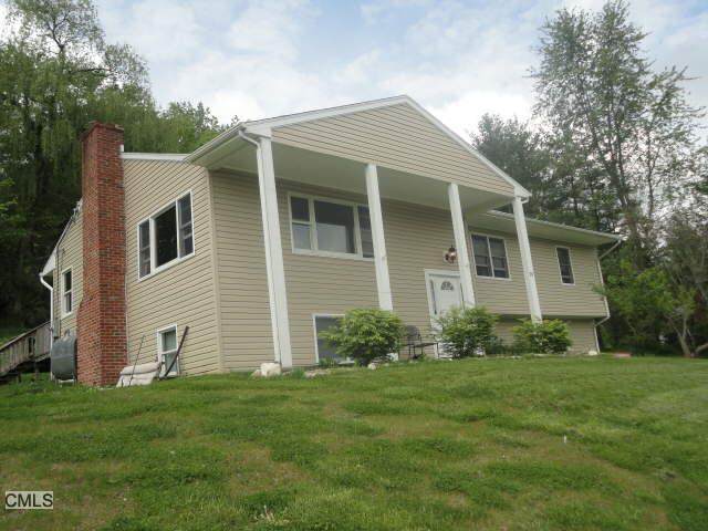 a front view of house with yard