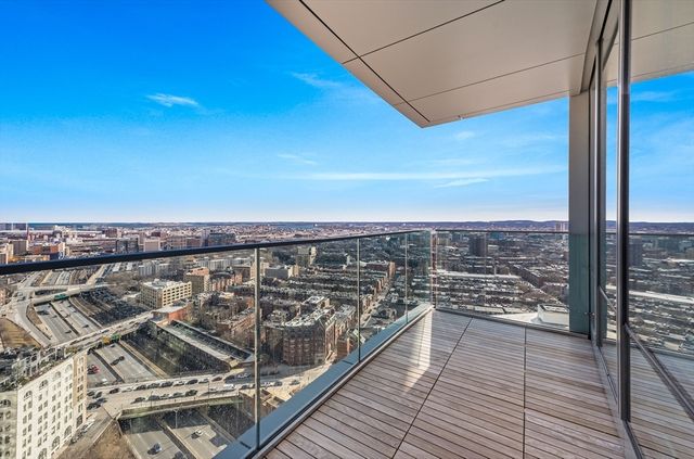 a view of a balcony with city view