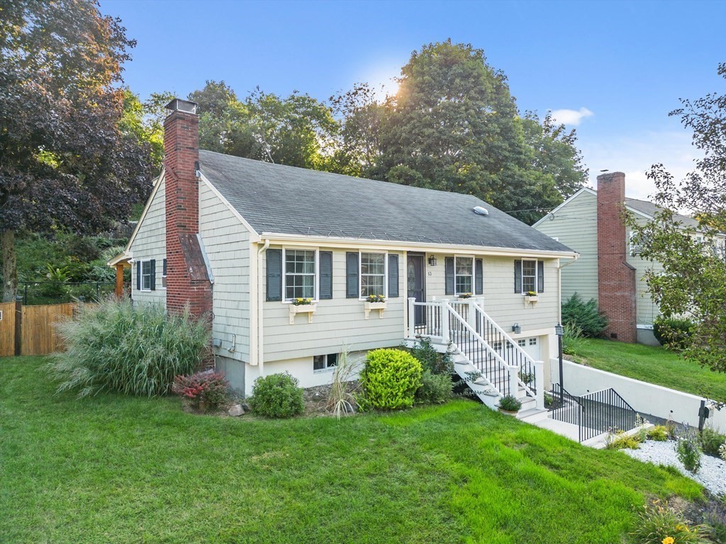 13 Surrey Road Salem, MA 01970 - Photo 1 of 42 a front view of house with yard and green space