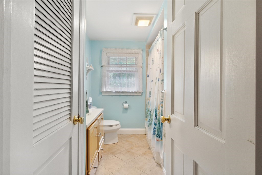 13 Surrey Road Salem, MA 01970 - Photo 15 of 42 a bathroom with a sink and toilet