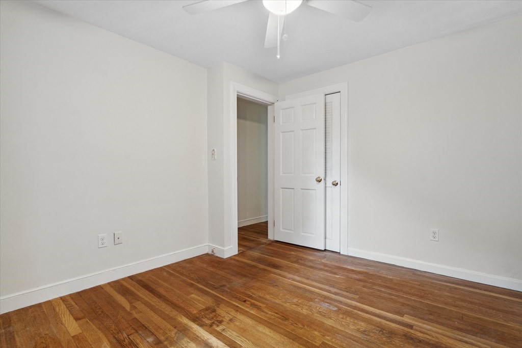 13 Surrey Road Salem, MA 01970 - Photo 19 of 42 wooden floor in an empty room