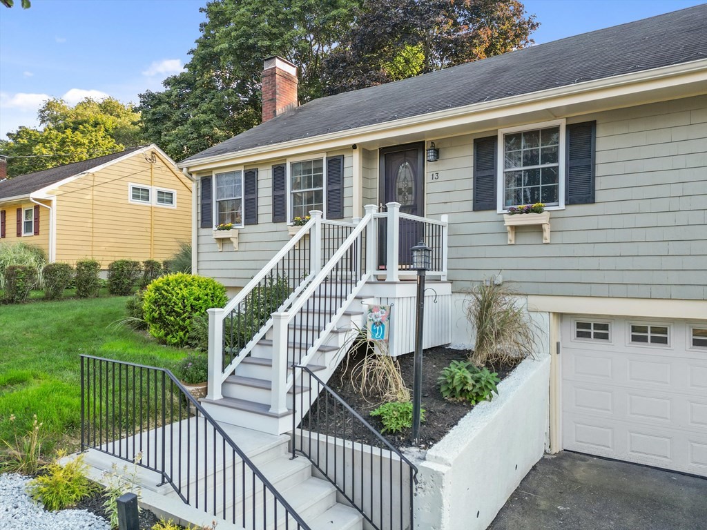 13 Surrey Road Salem, MA 01970 - Photo 3 of 42 a view of a house with wooden fence