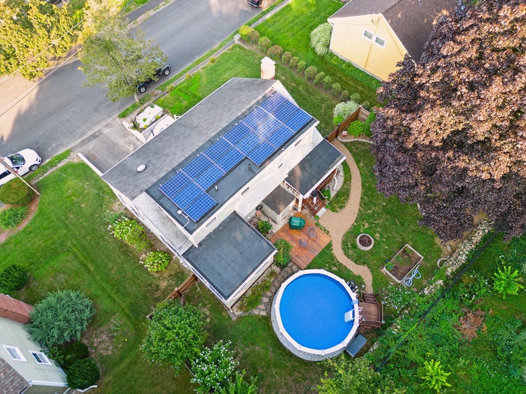 13 Surrey Road Salem, MA 01970 - Photo 36 of 42 an aerial view of a house with a swimming pool outdoor seating and yard