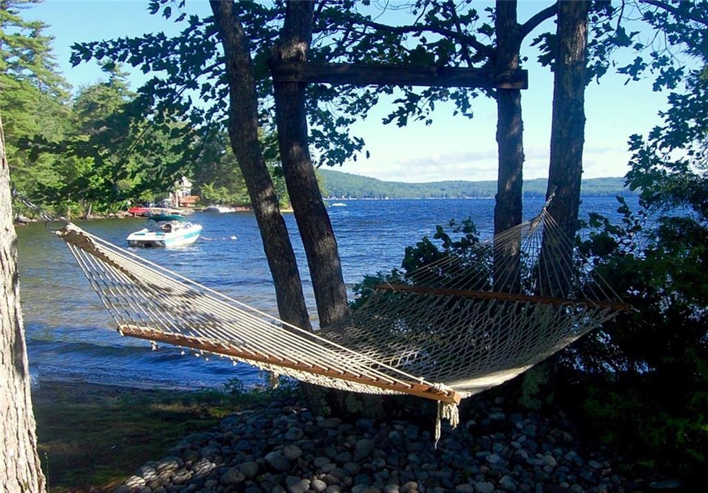 71 Stony Point Road Belgrade, ME 04917 - Photo 22 of 34 Nap in the hammock next to the...