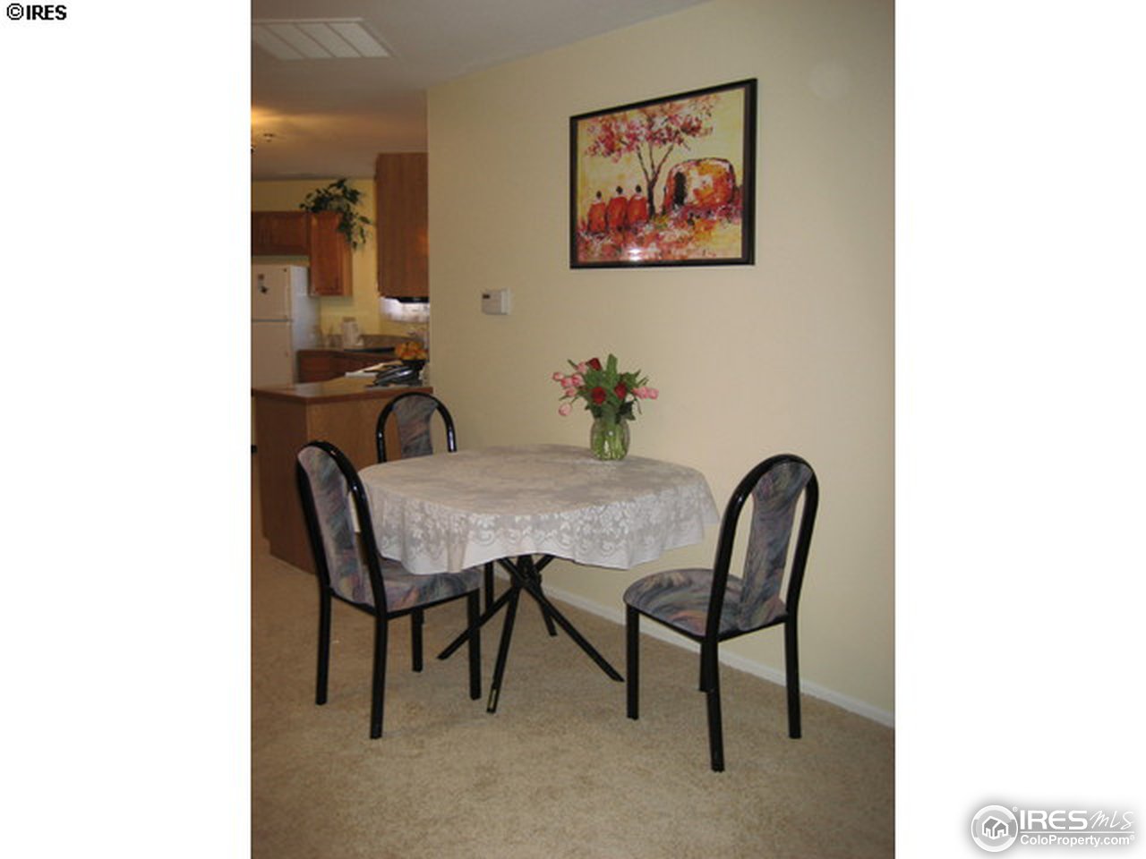 4965 Twin Lakes Road, Unit 64 Boulder, CO 80301 - Photo 4 of 6 a view of a dining room with furniture
