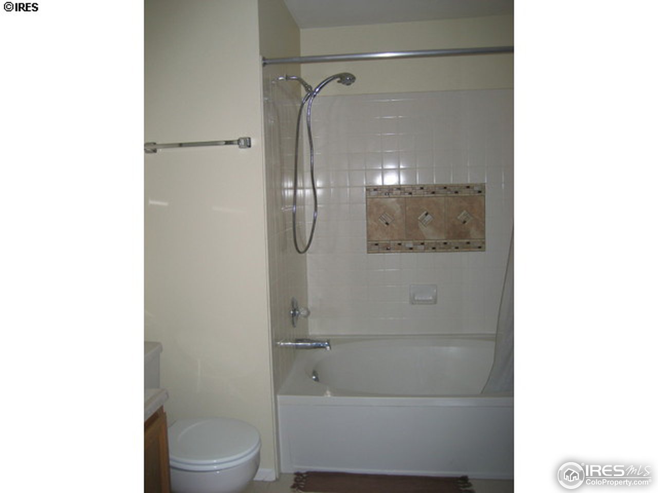 4965 Twin Lakes Road, Unit 64 Boulder, CO 80301 - Photo 5 of 6 a bathroom with a shower and toilet