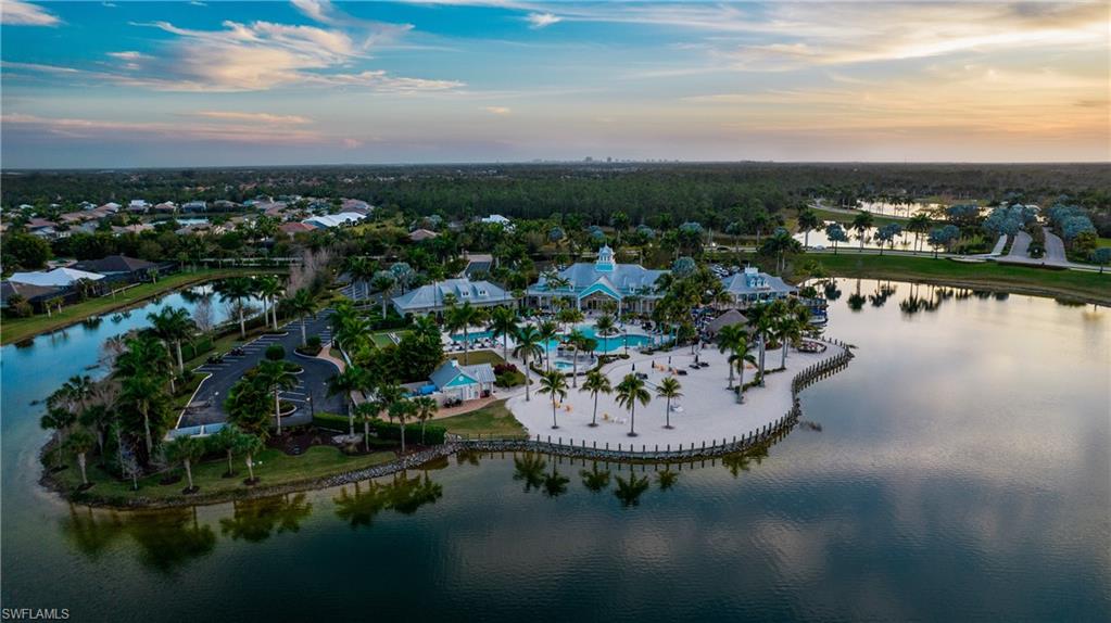 14837 Windward Lane Naples, FL 34114 - Photo 45 of 45 a view of a lake in a residential houses with outdoor space