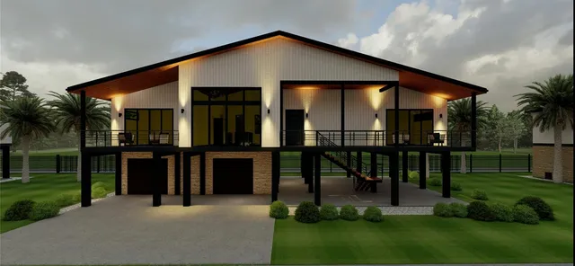 a front view of house with a garden