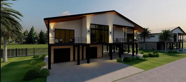 a front view of a house with a garden and trees