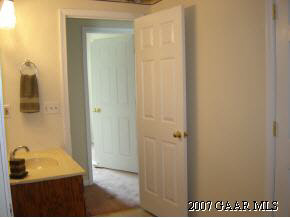 98 Buckboard Road Waynesboro, VA 22980 - Photo 5 of 10 a bathroom with a sink and shower