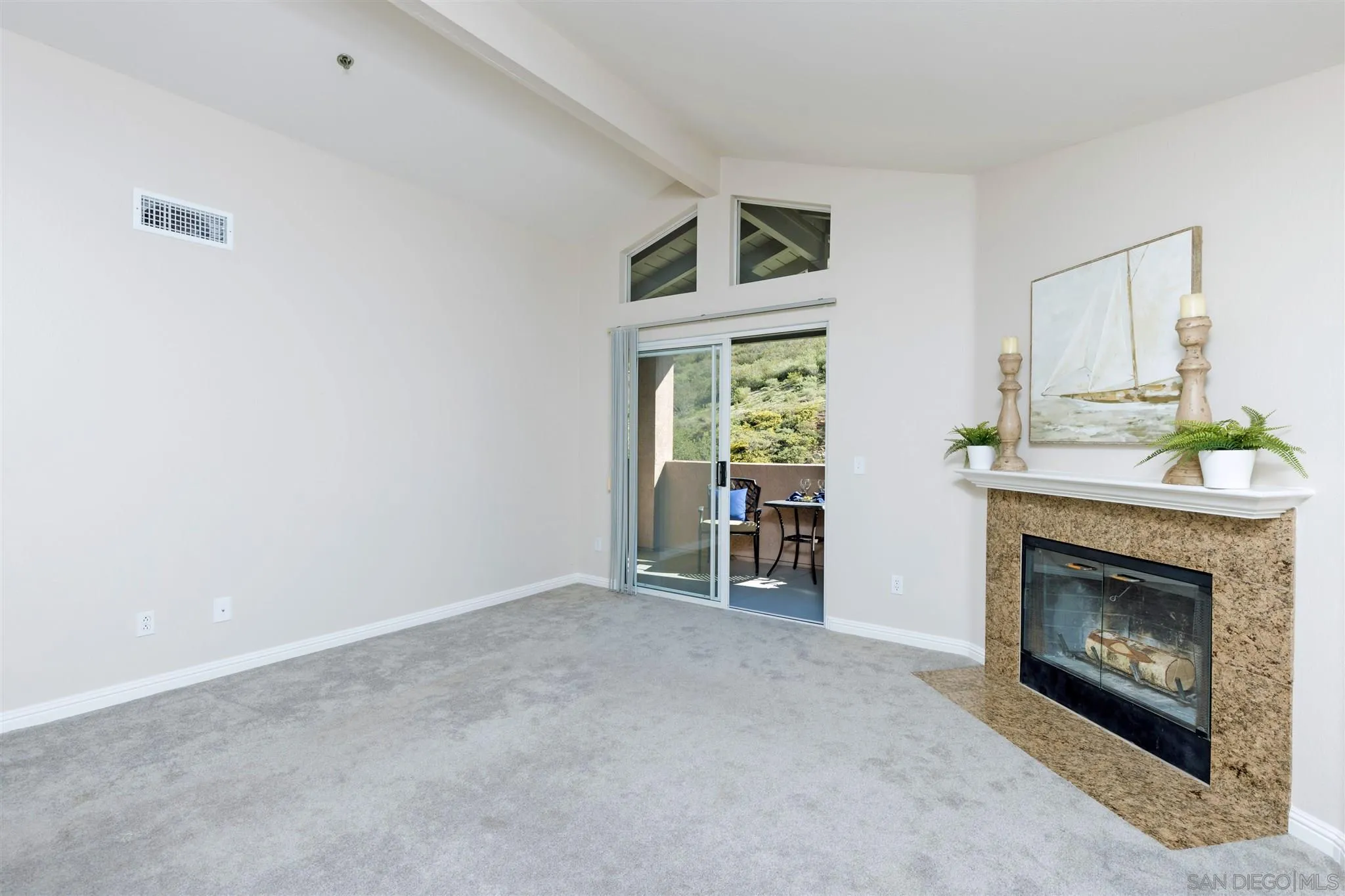 17161 Alva Road, Unit 931 San Diego, CA 92127 - Photo 11 of 30 a room with furniture and a fireplace