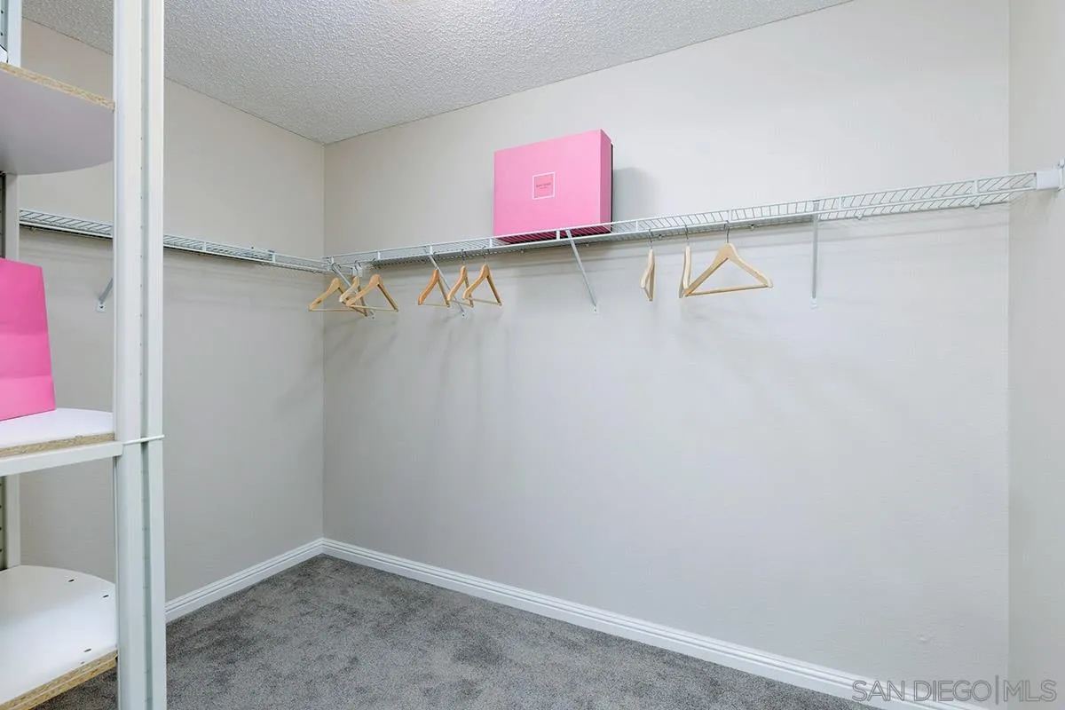 17161 Alva Road, Unit 931 San Diego, CA 92127 - Photo 18 of 30 a view of a room with racks on the wall