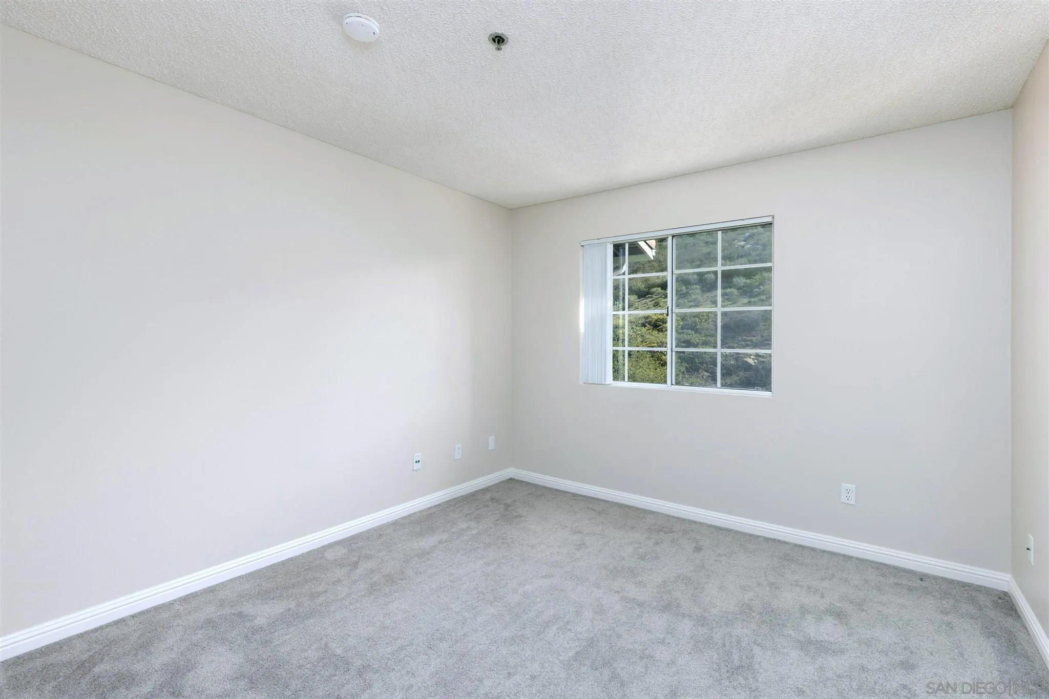 17161 Alva Road, Unit 931 San Diego, CA 92127 - Photo 19 of 30 an empty room with a window