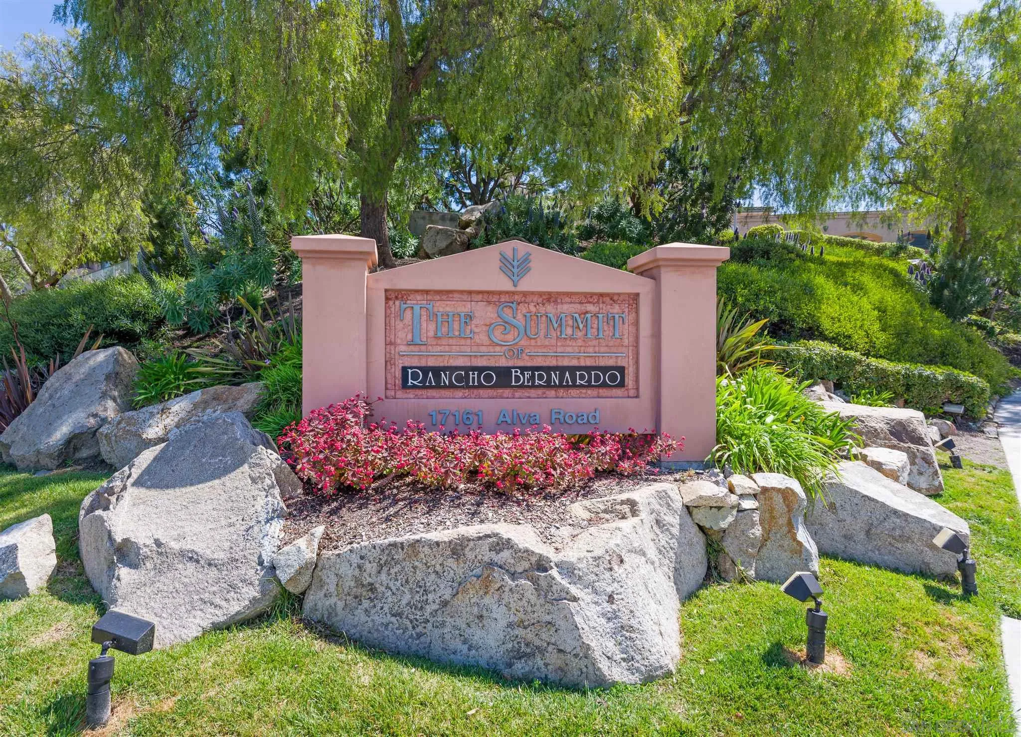 17161 Alva Road, Unit 931 San Diego, CA 92127 - Photo 21 of 30 a sign that is sitting in front of flowers