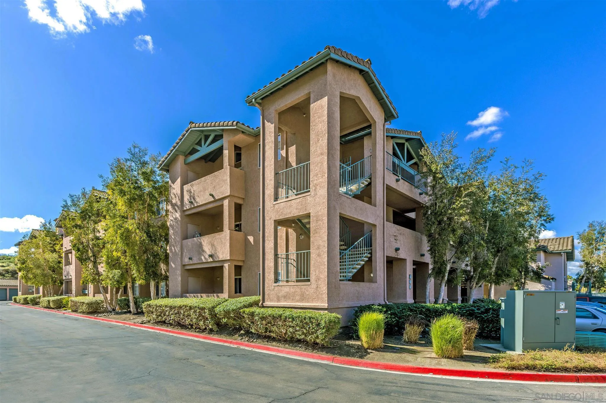 17161 Alva Road, Unit 931 San Diego, CA 92127 - Photo 22 of 30 a front view of a house with a yard