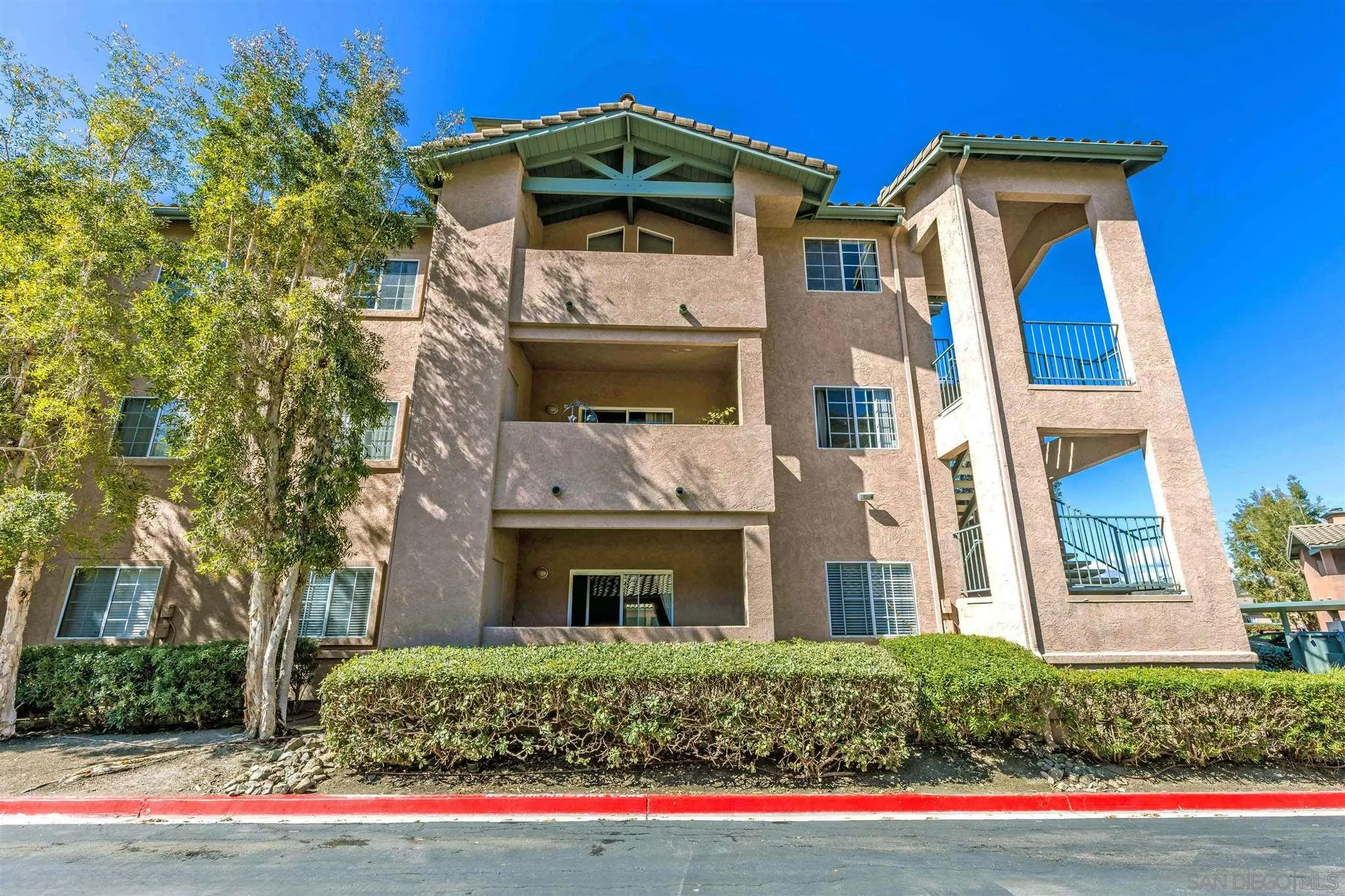 17161 Alva Road, Unit 931 San Diego, CA 92127 - Photo 23 of 30 a front view of a house with a yard