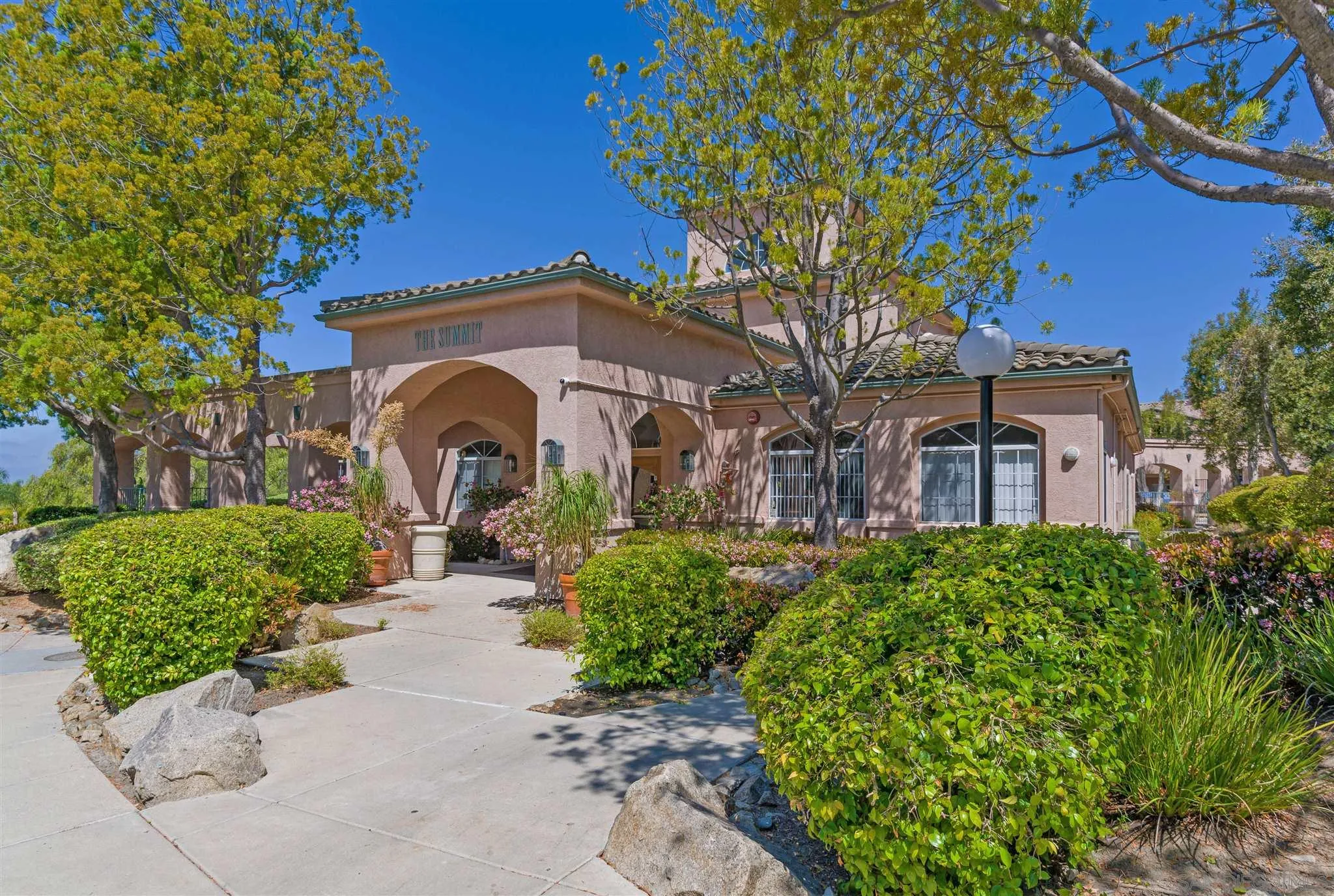 17161 Alva Road, Unit 931 San Diego, CA 92127 - Photo 24 of 30 a front view of a house with a garden