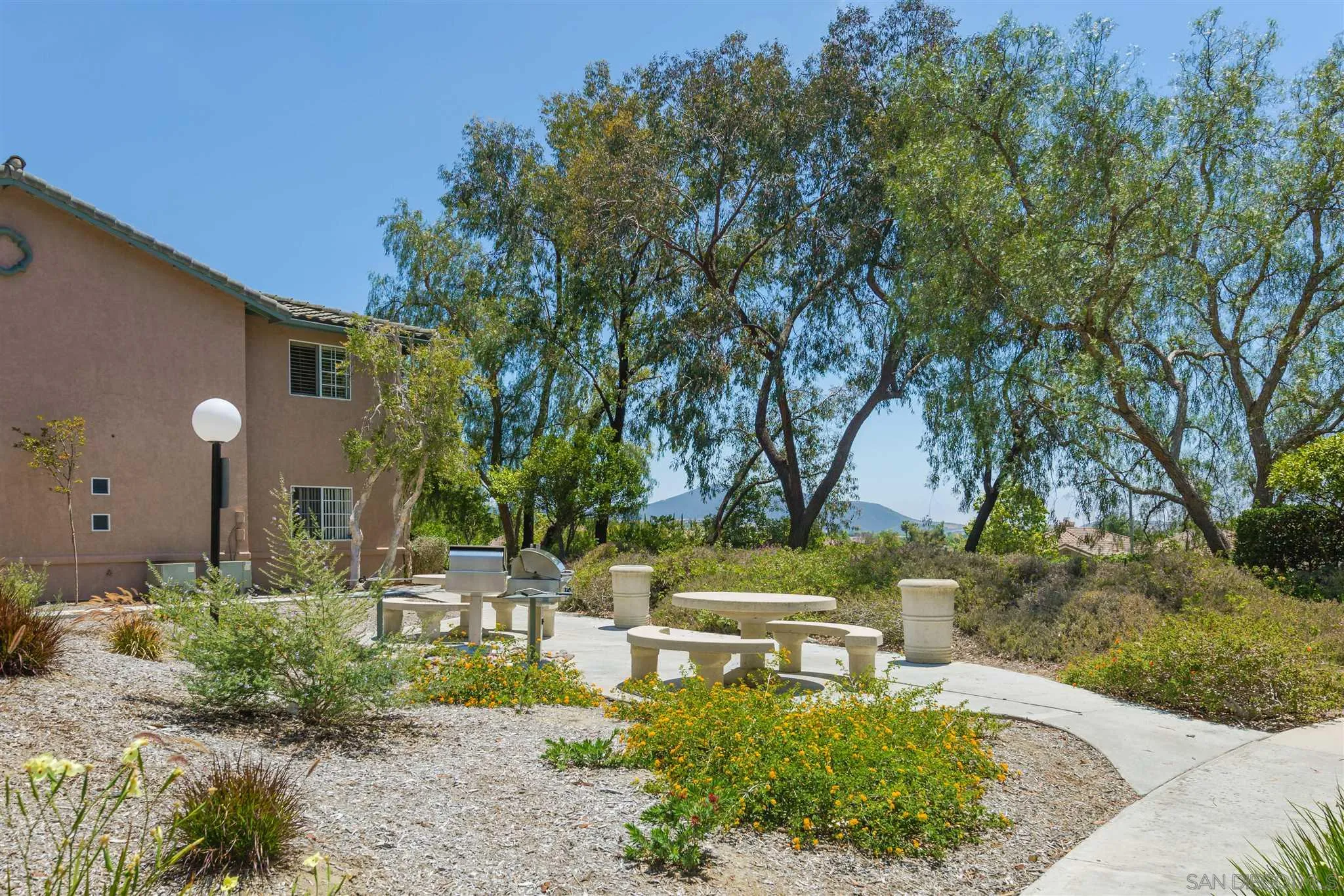 17161 Alva Road, Unit 931 San Diego, CA 92127 - Photo 30 of 30 a garden view with a seating space