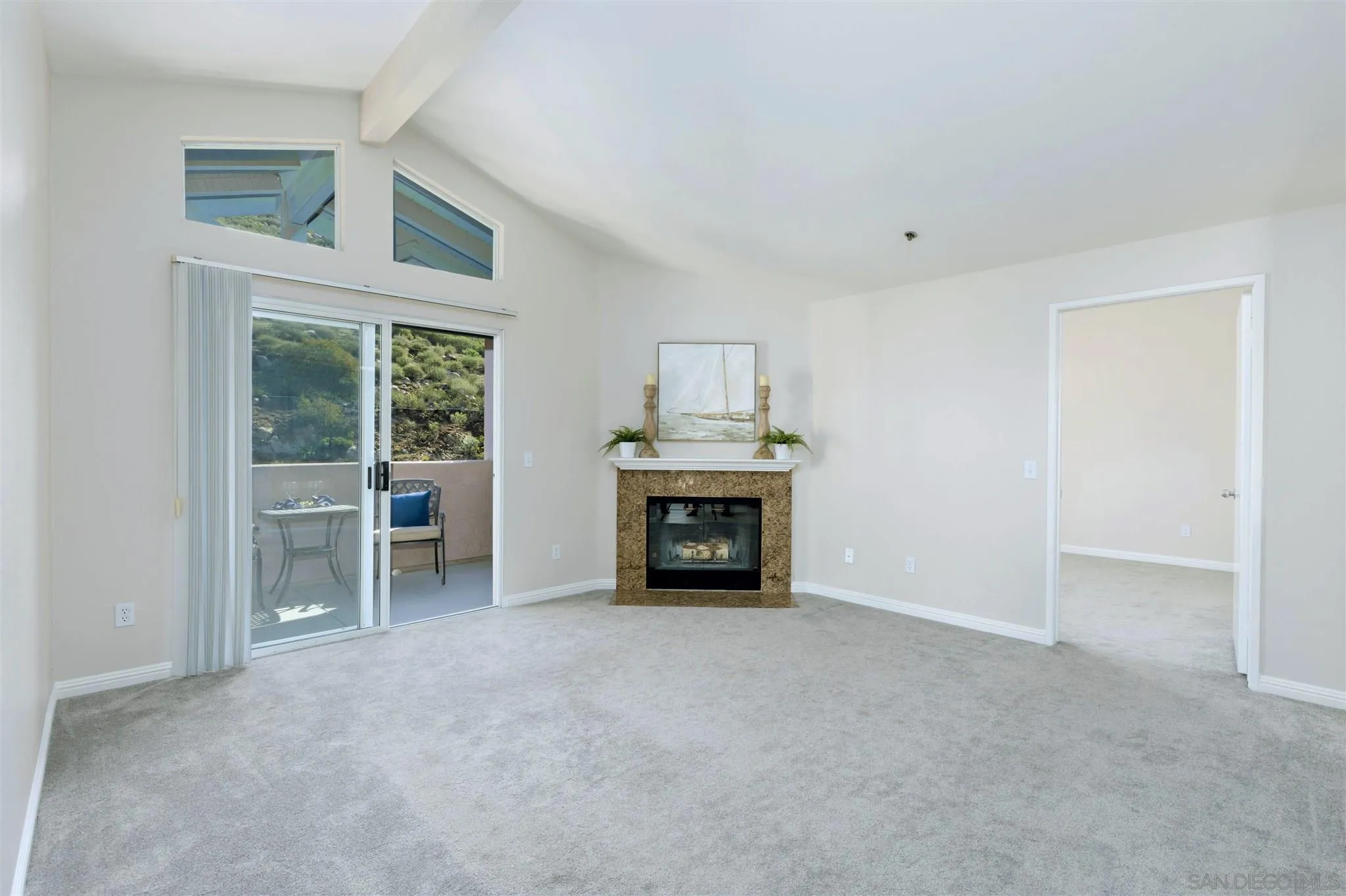 17161 Alva Road, Unit 931 San Diego, CA 92127 - Photo 10 of 30 a view of livingroom with furniture and a fireplace