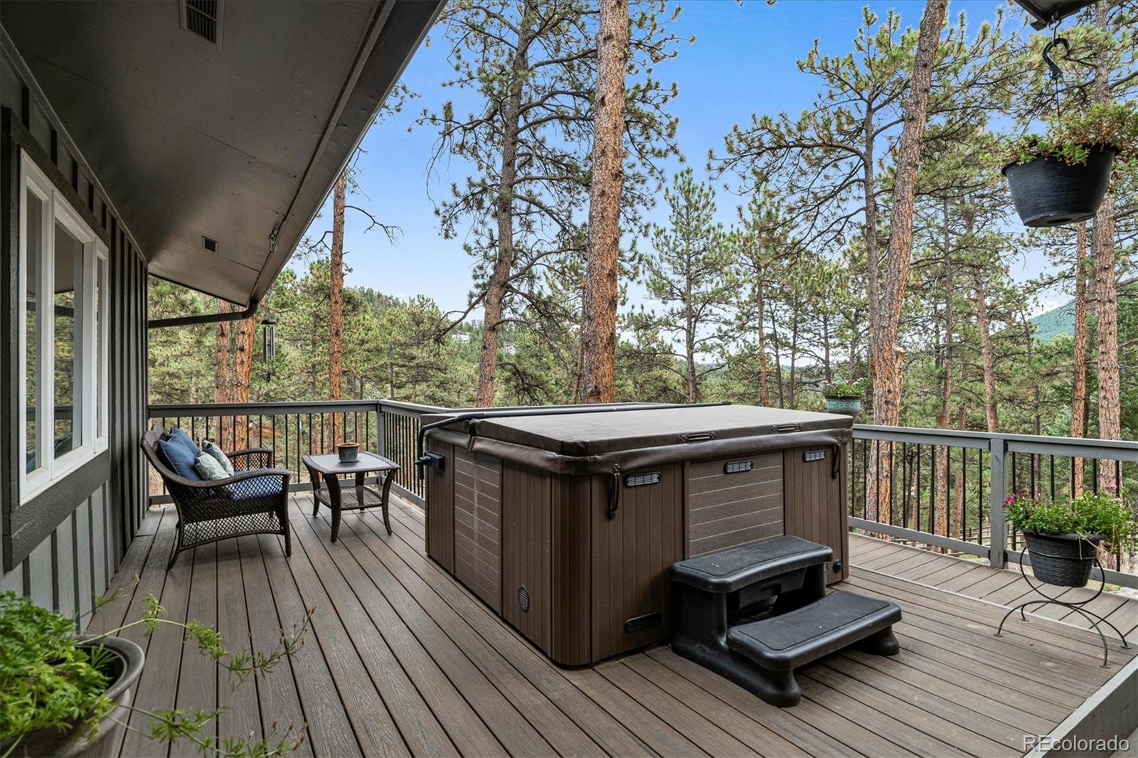 28867 Cedar Circle Evergreen, CO 80439 - Photo 28 of 35 a view of roof deck with patio
