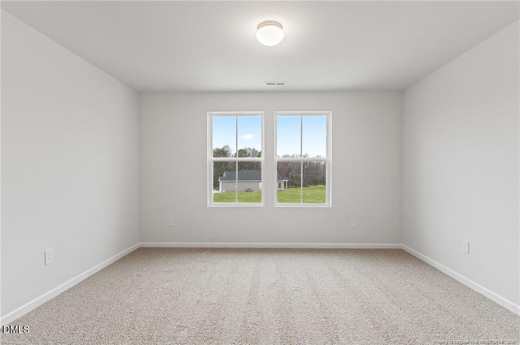 100 Rubyfield Court Fremont, NC 27830 - Photo 18 of 38 an empty room with windows