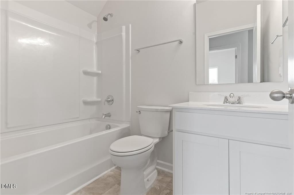 100 Rubyfield Court Fremont, NC 27830 - Photo 7 of 38 a bathroom with a sink toilet and shower
