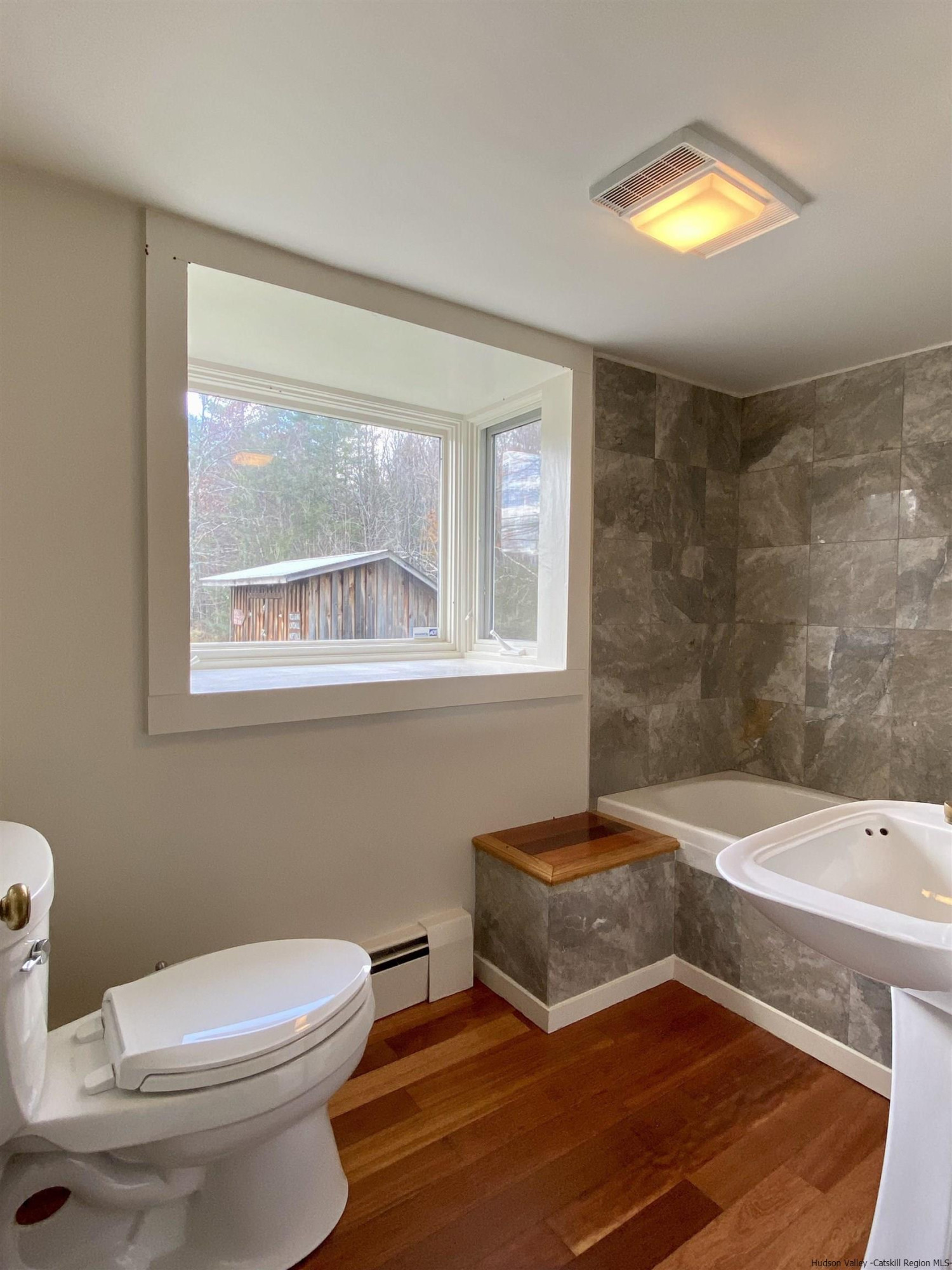 83 Palentown Road Kerhonkson, NY 12446 - Photo 13 of 30 a bathroom with a sink and a toilet