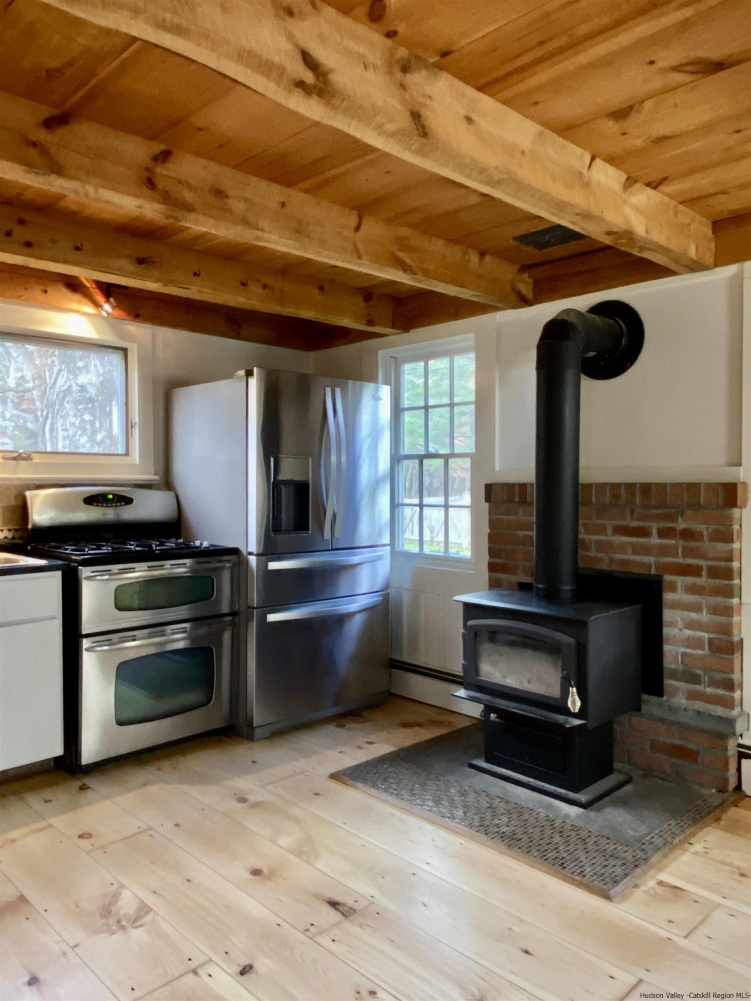 83 Palentown Road Kerhonkson, NY 12446 - Photo 18 of 30 a kitchen with stainless steel appliances kitchen island granite countertop a stove and a refrigerator