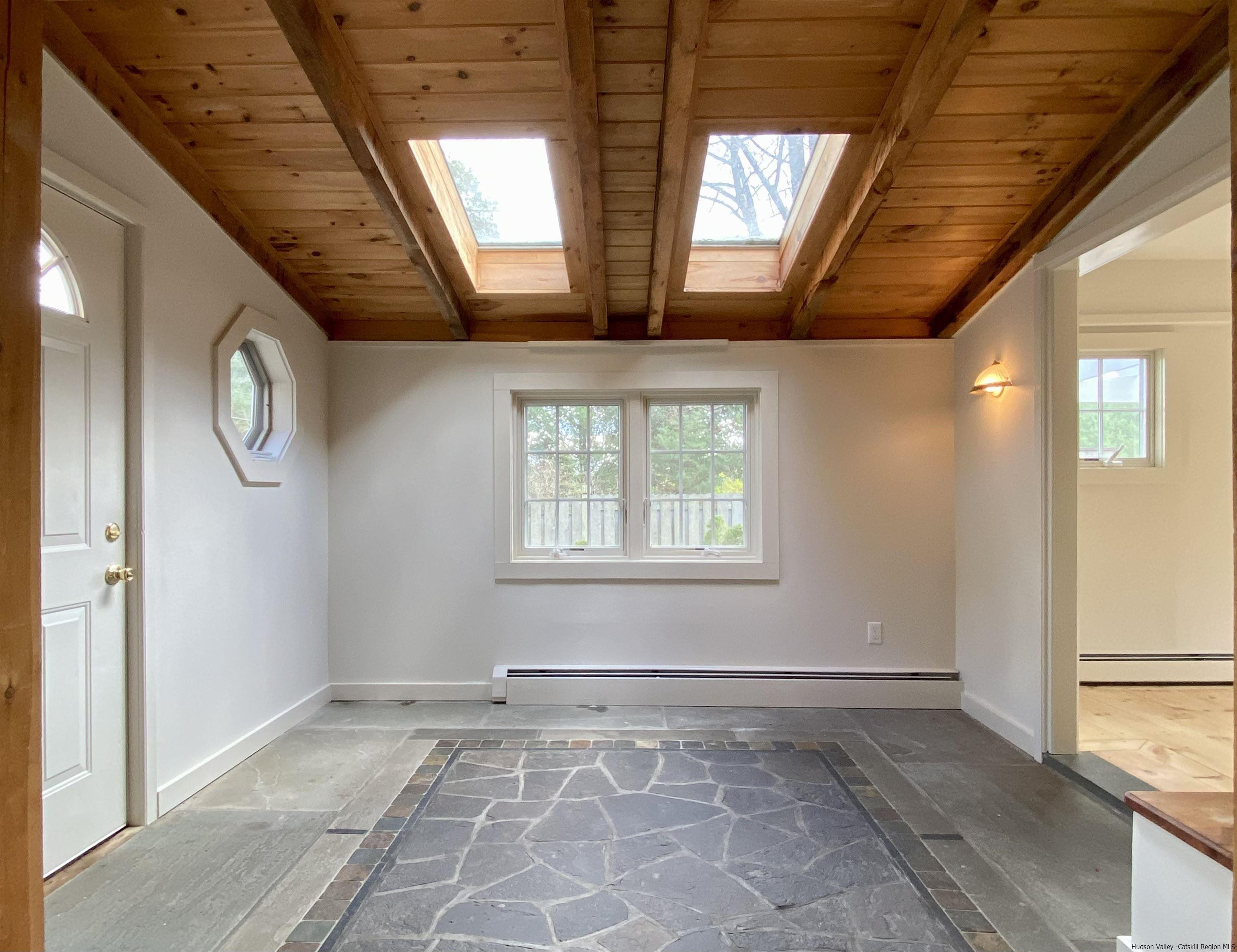 83 Palentown Road Kerhonkson, NY 12446 - Photo 20 of 30 a view of an empty room with windows