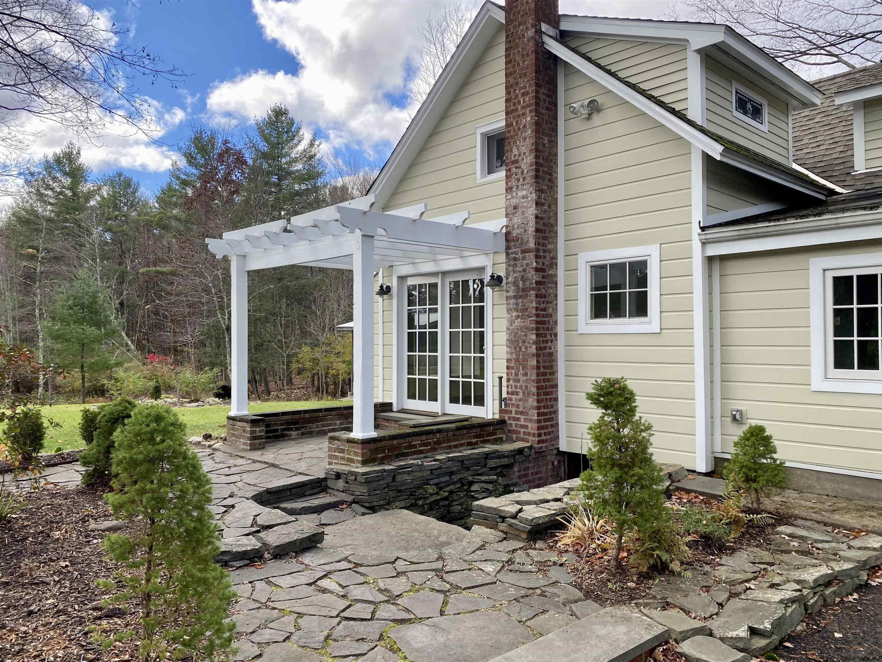 83 Palentown Road Kerhonkson, NY 12446 - Photo 3 of 30 a front view of a house with garden