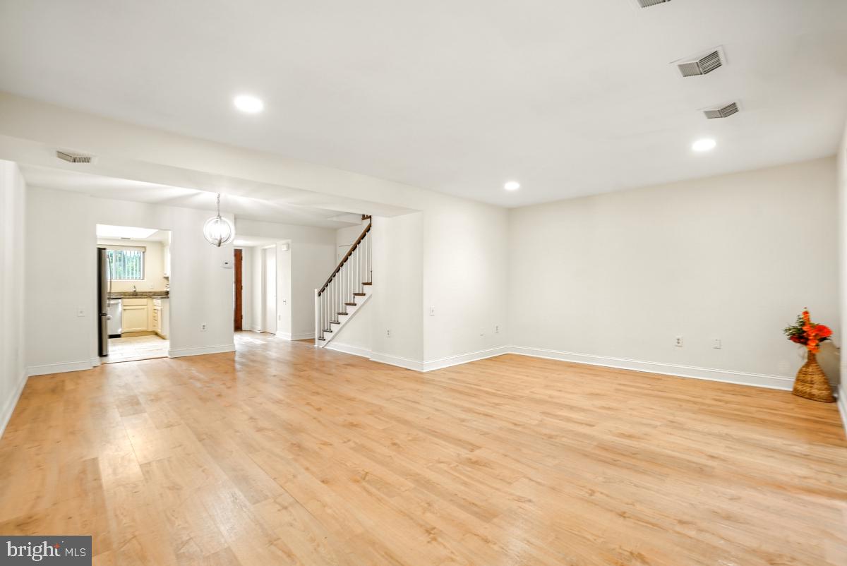 3434 Gleneagles Drive, Unit 78B Silver Spring, MD 20906 - Photo 15 of 31 a view of empty room with wooden floor