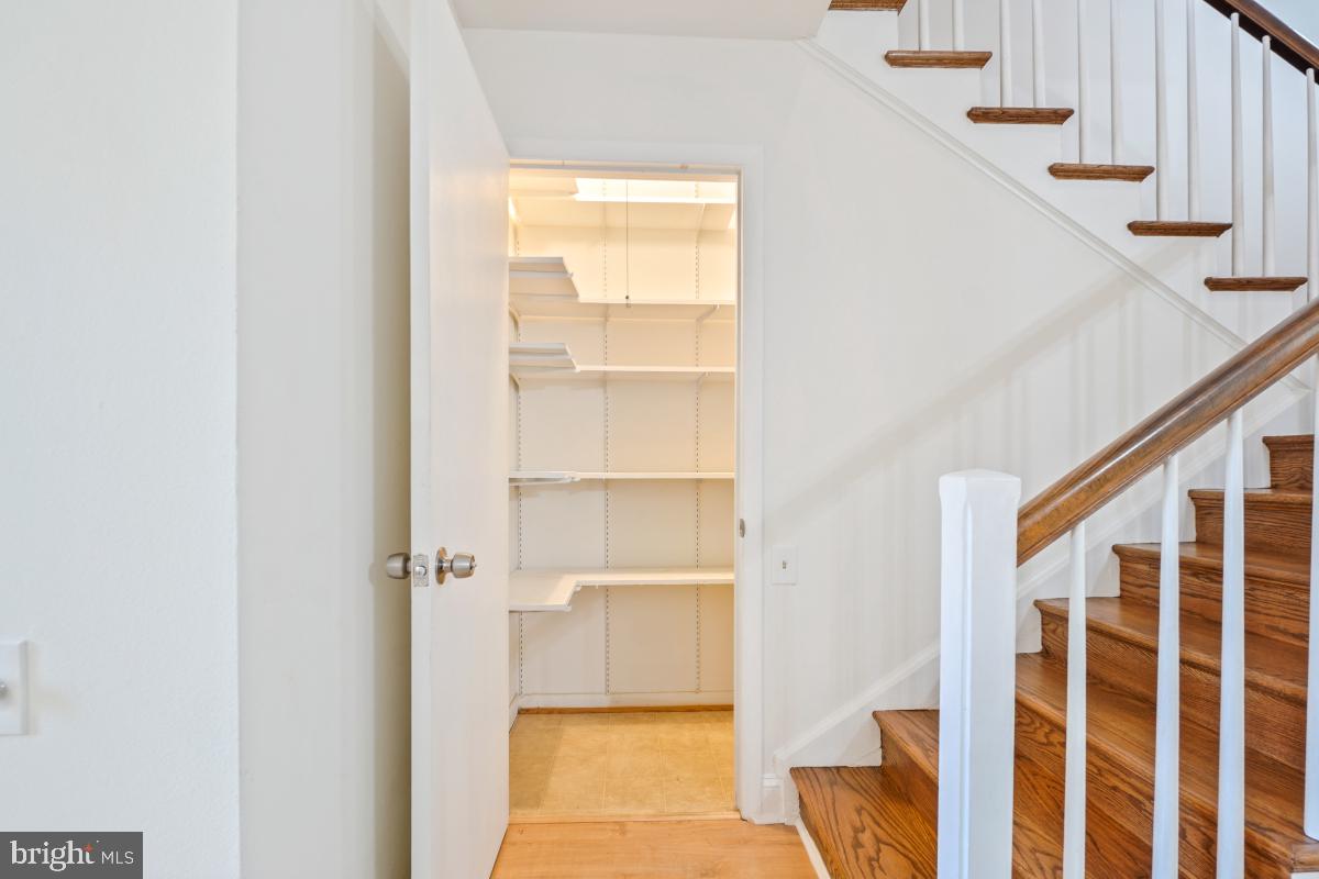 3434 Gleneagles Drive, Unit 78B Silver Spring, MD 20906 - Photo 20 of 31 a view of a hallway with wooden floor and entryway