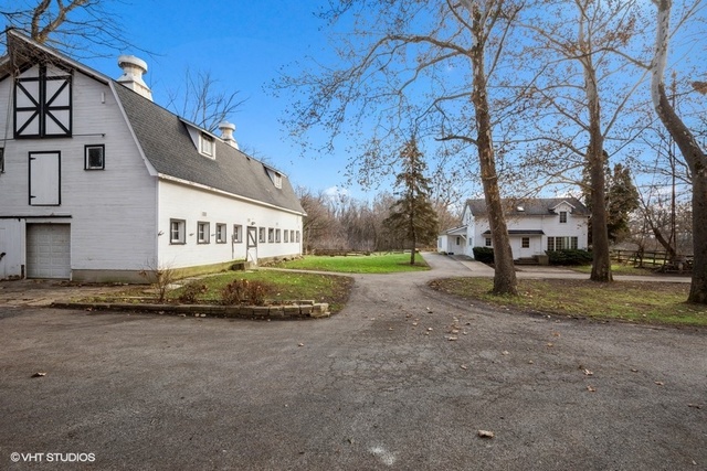 104 West County Line Road Barrington Hills, IL 60010 - Photo 1 of 1 a view of a house with a yard