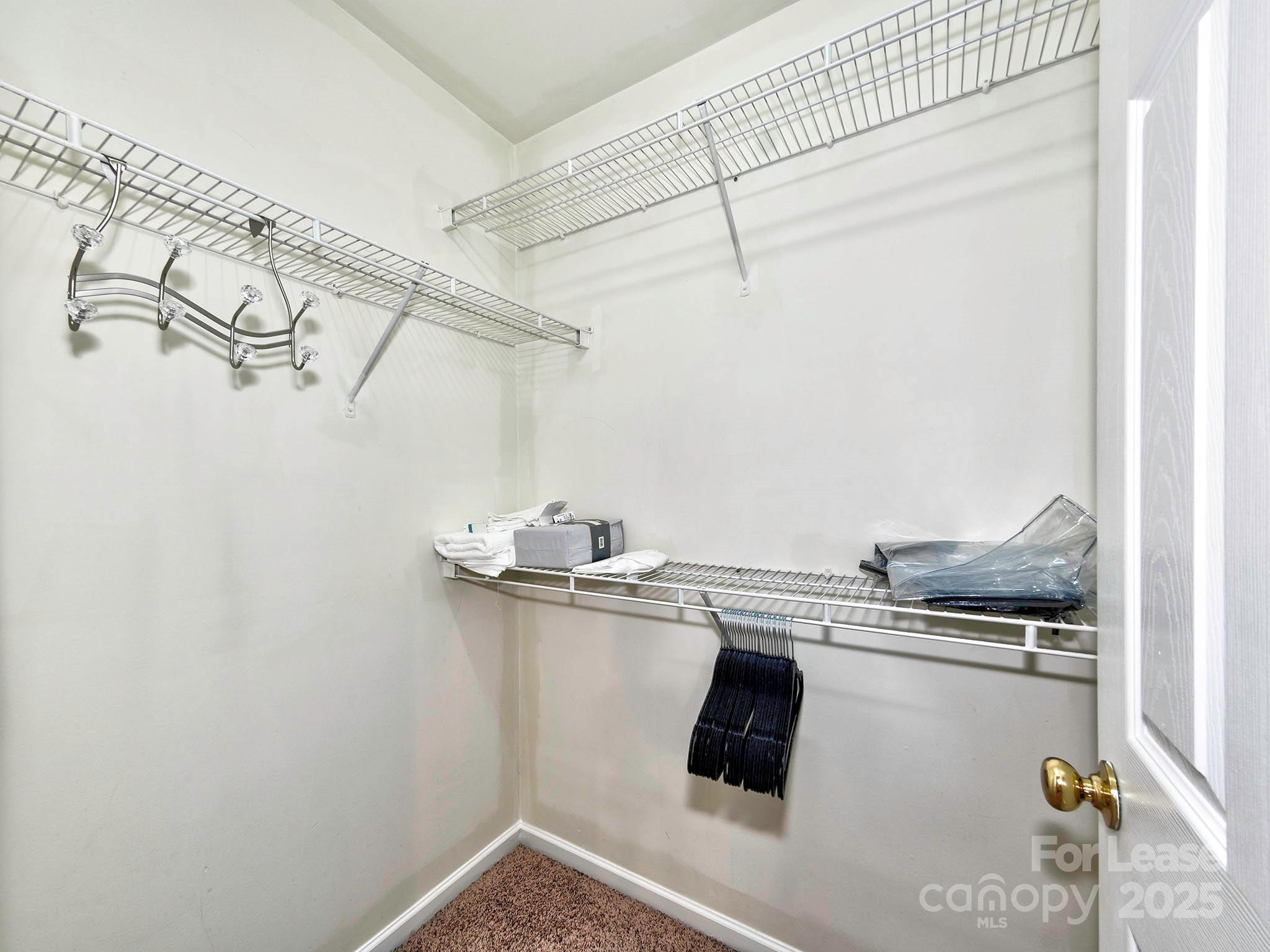 11316 Morgan Valley Lane Charlotte, NC 28270 - Photo 18 of 33 a room with stainless steel appliances wooden floor