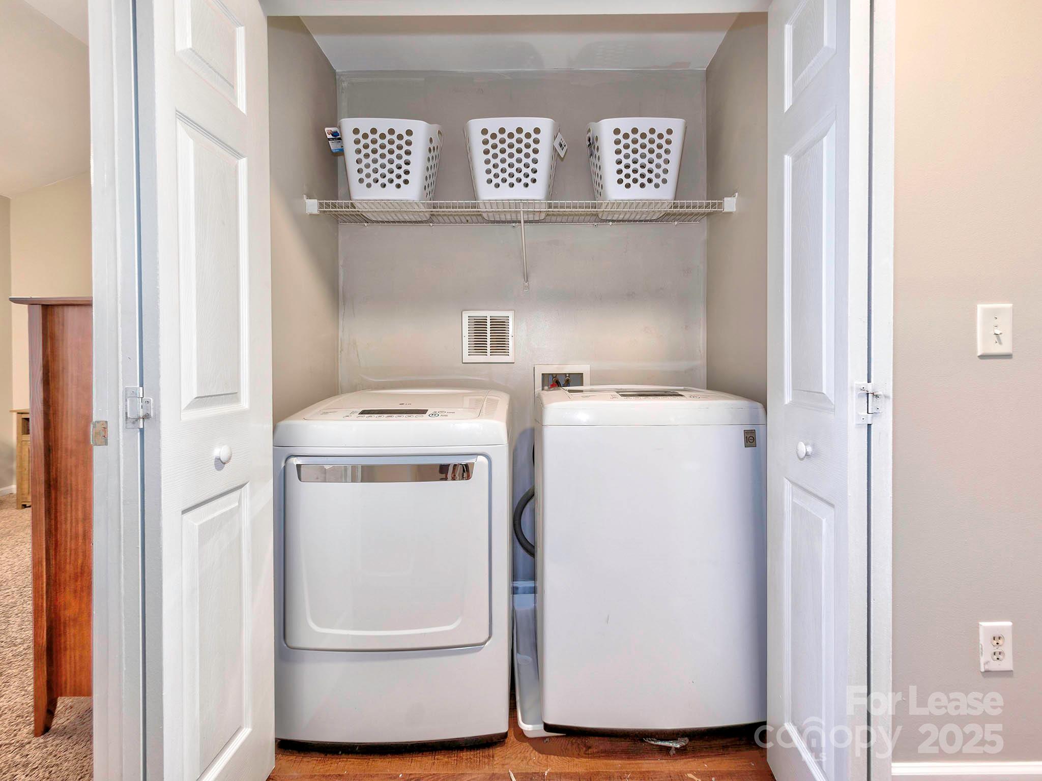 11316 Morgan Valley Lane Charlotte, NC 28270 - Photo 19 of 33 a utility room with dryer and washer