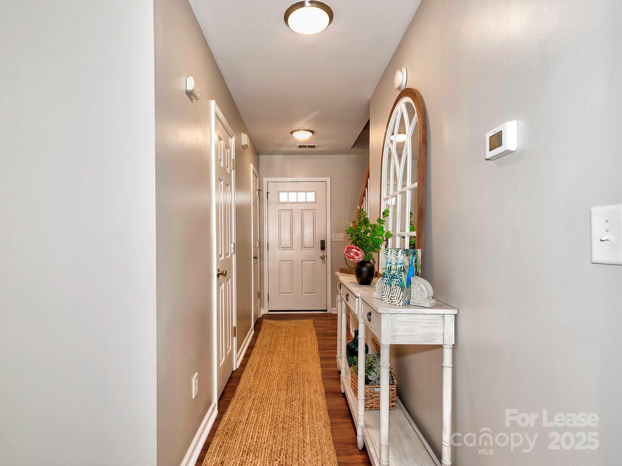 11316 Morgan Valley Lane Charlotte, NC 28270 - Photo 3 of 33 a view of entryway with wooden floor