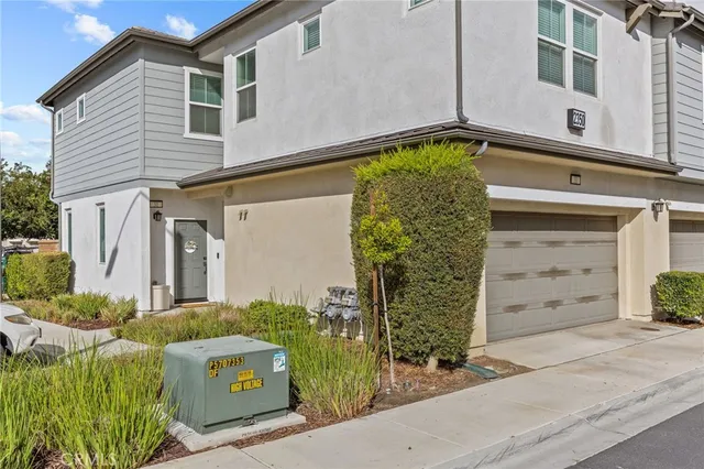 an aerial view of a building with garden space
