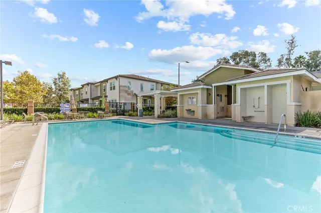 a view of a park with large trees