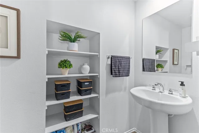 a bathroom with a sink and a toilet